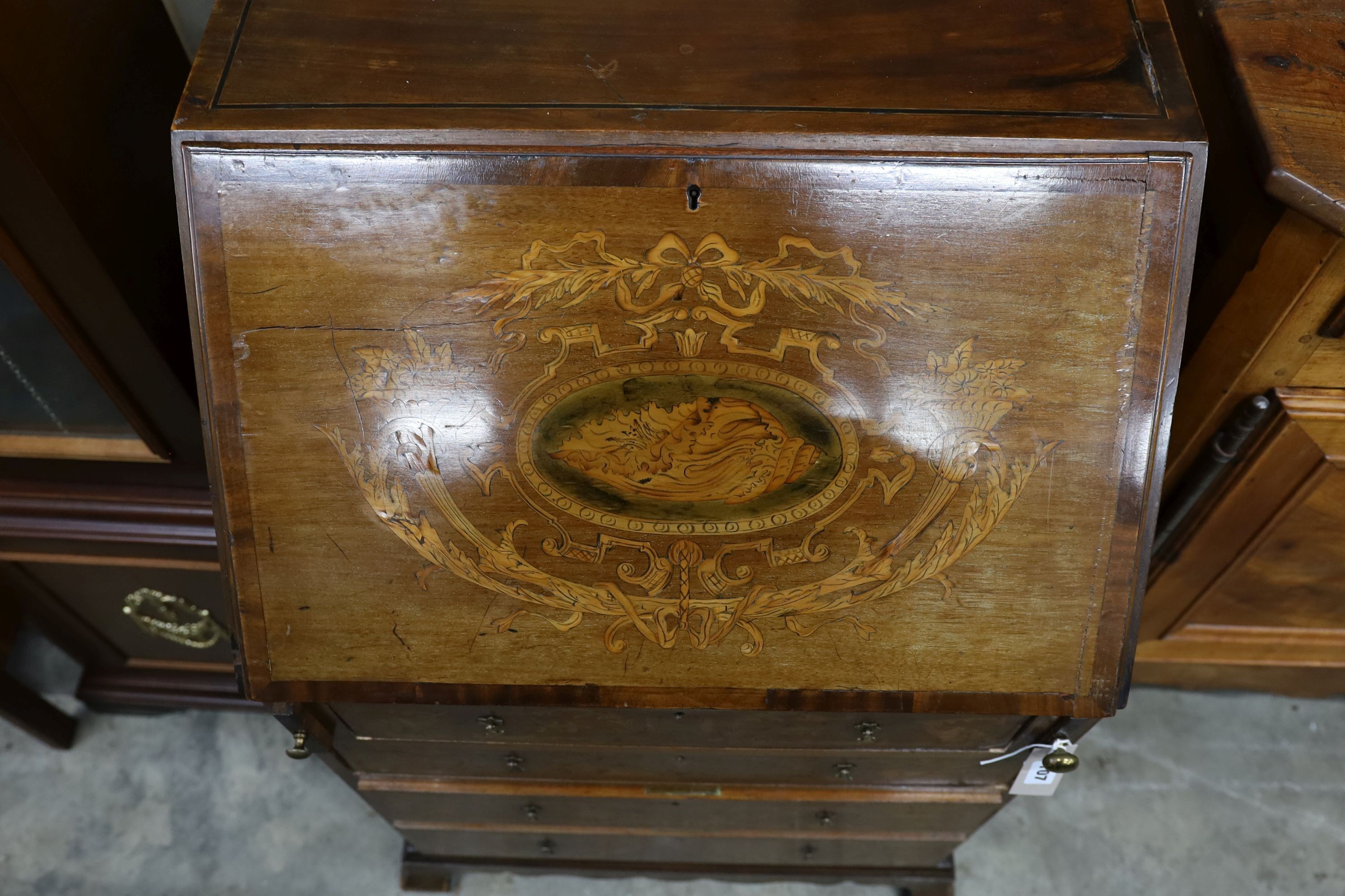 An Edwardian marquetry inlaid mahogany bureau, width 61cm, depth 46cm, height 99cm